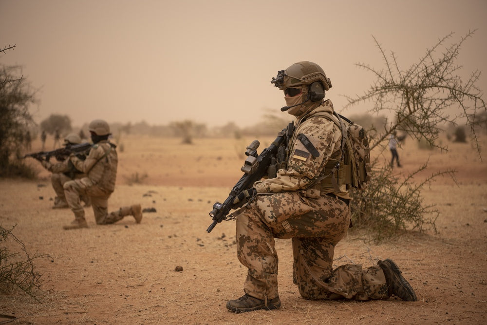 German Bundeswehr soldiers work alongside a group of Mauritanian troops