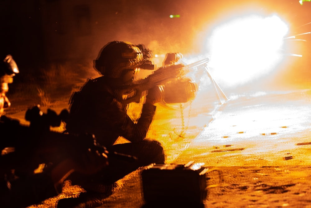 Ukrainian special operations forces (SOF) soldier provides covering fire for a joint raid exercise between Ukrainian Special Forces and U.S. Navy SEALs during exercise Sea Breeze 21
