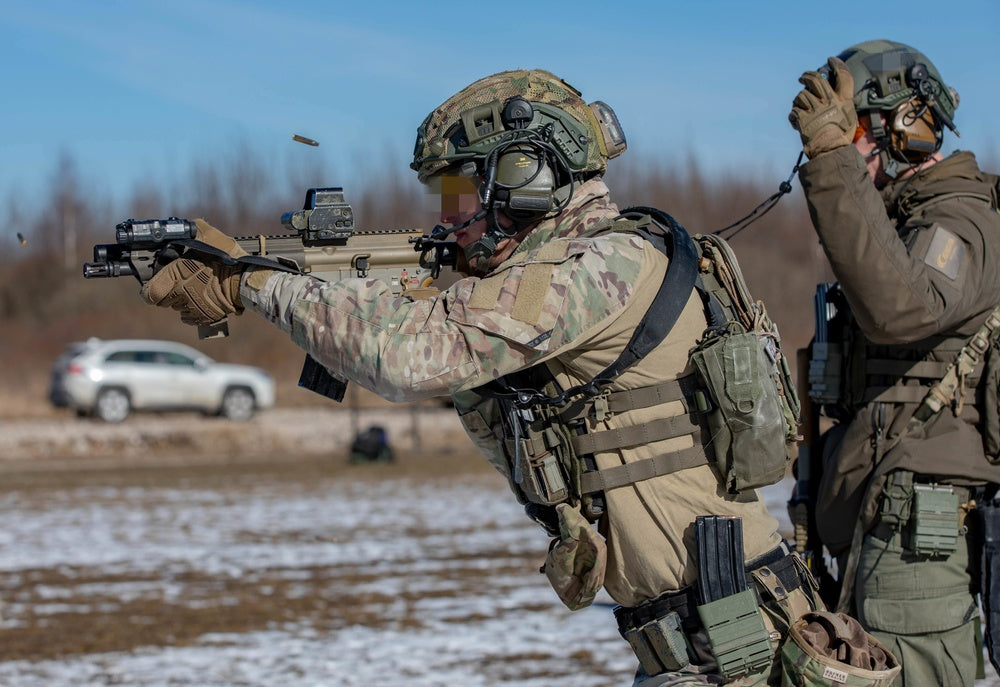 Lithuanian Special Forces undergo timed range evaluations during a joint exercise with U.S. Special Forces