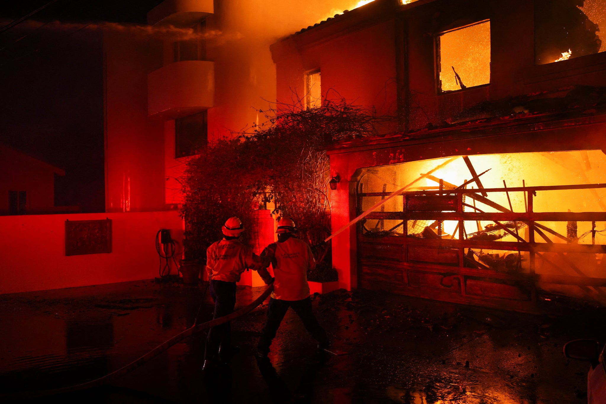 News At least five dead, 100,000 told to evacuate as Los Angeles