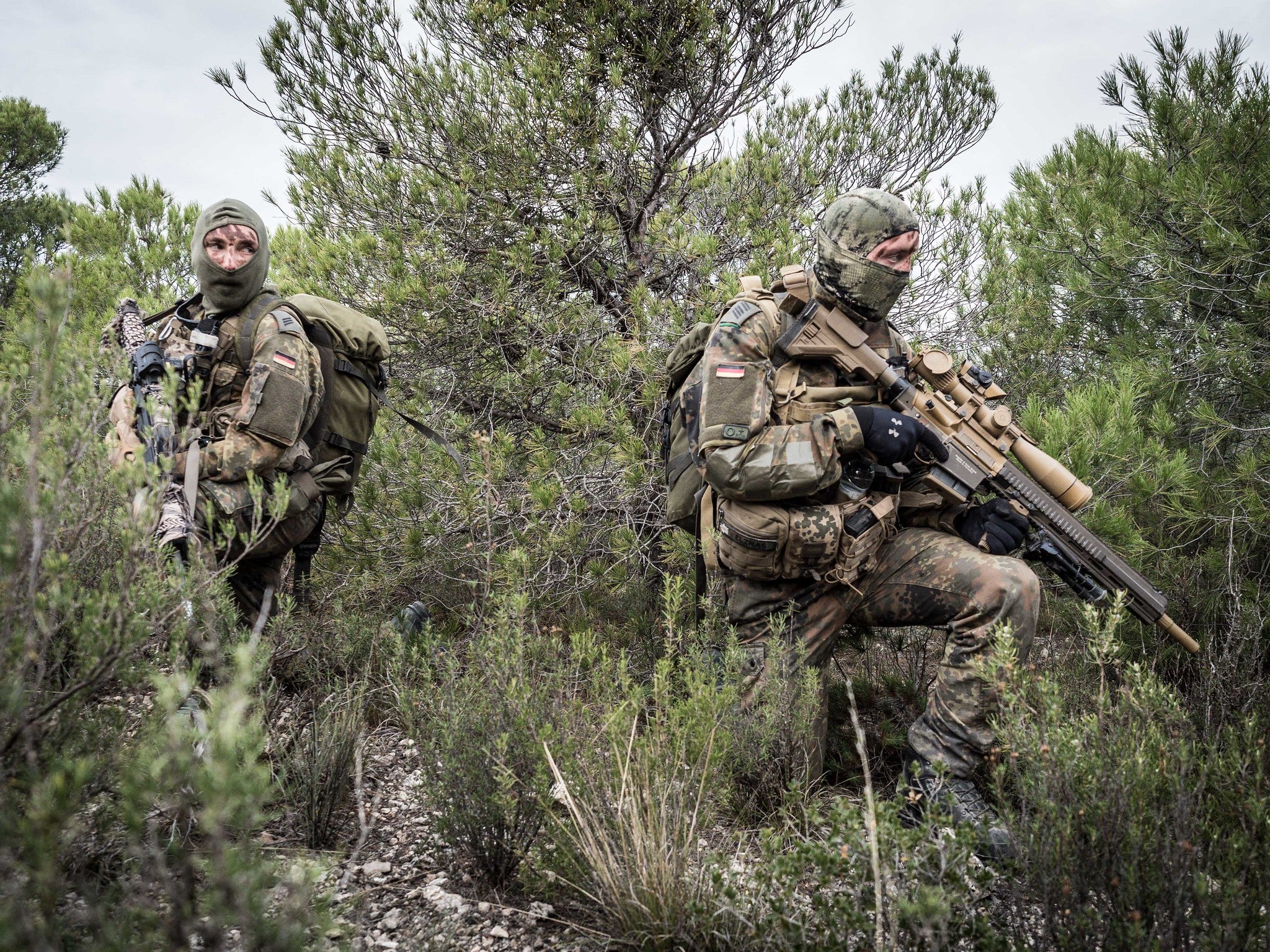 A German Mountain Infantry DMR team is seen getting into position with a G28 rifle during the Trident Juncture 15 joint drill