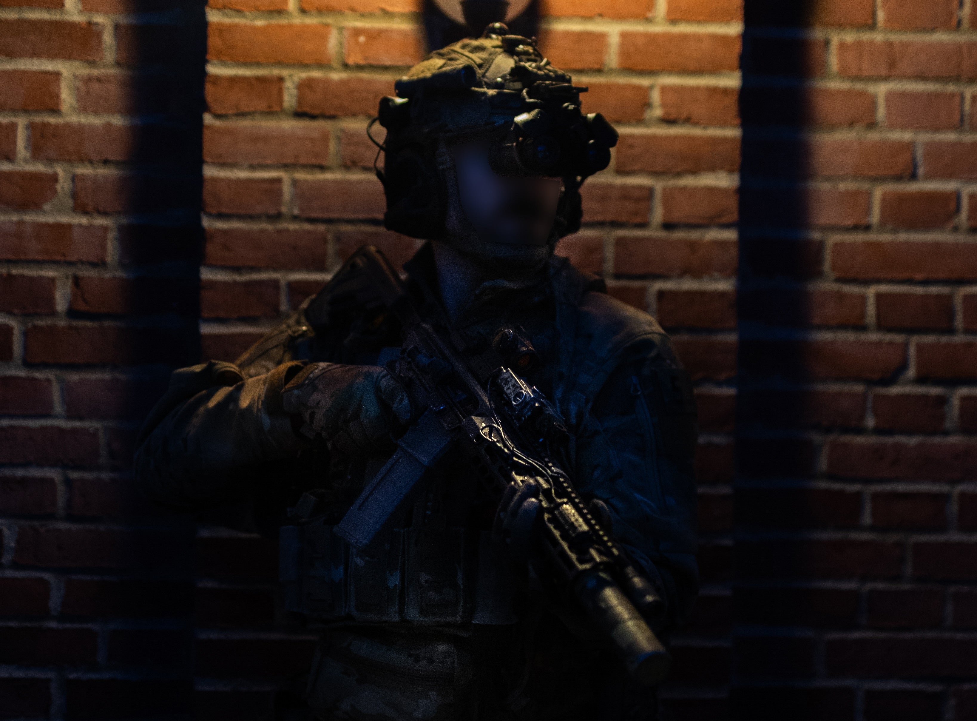 An operator from the Royal Danish Army’s special Jaeger Corps force pulls security during a joint exercise with NATO allies
