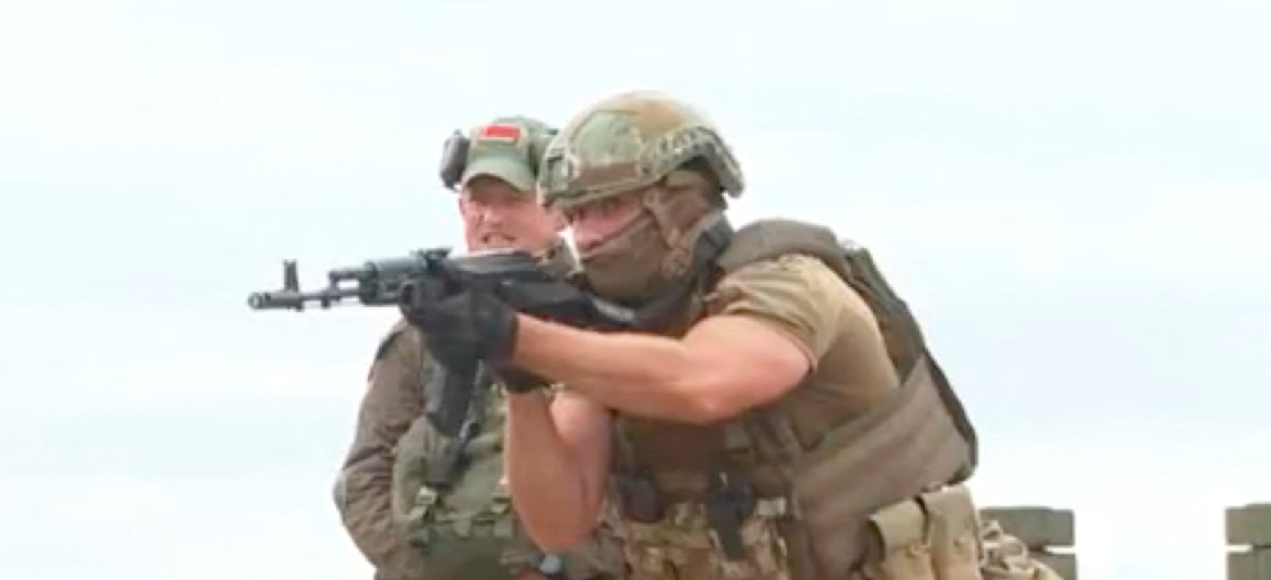 A fighter from Russian Wagner mercenary group conducts training for Belarusian soldiers
