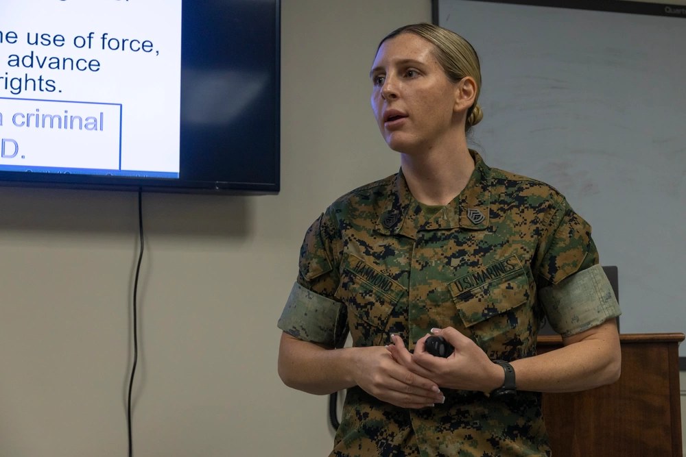 Illustrative file photo — Marine Corps Gunnery Sgt. Mariah Hammond, an Equal Opportunity Advisor, gives a class on prohibited activities, conduct and the complaint process at MCAS Cherry Point, North Carolina, Aug. 9, 2023. U.S. Marine Corps photo by