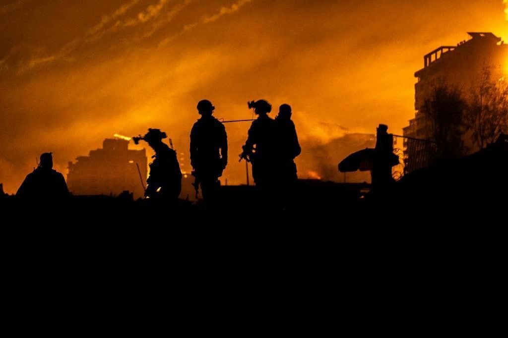 Israeli hostages killed in Gaza were holding white flag, official says