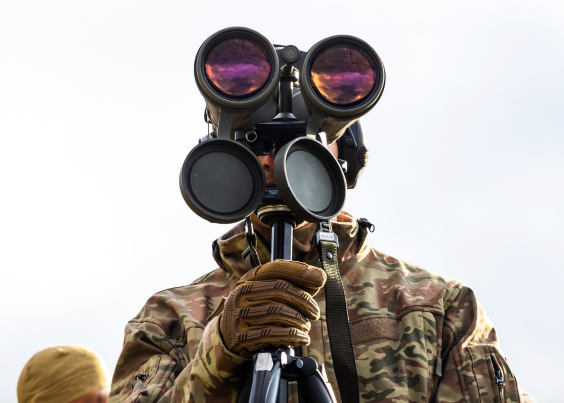 A Turkish Special Forces Sniper Instructor spots targets at long range at the International Specialty Training Center (ISTC) Alpine Sniper Course, in Hochfilzen training area, Austria