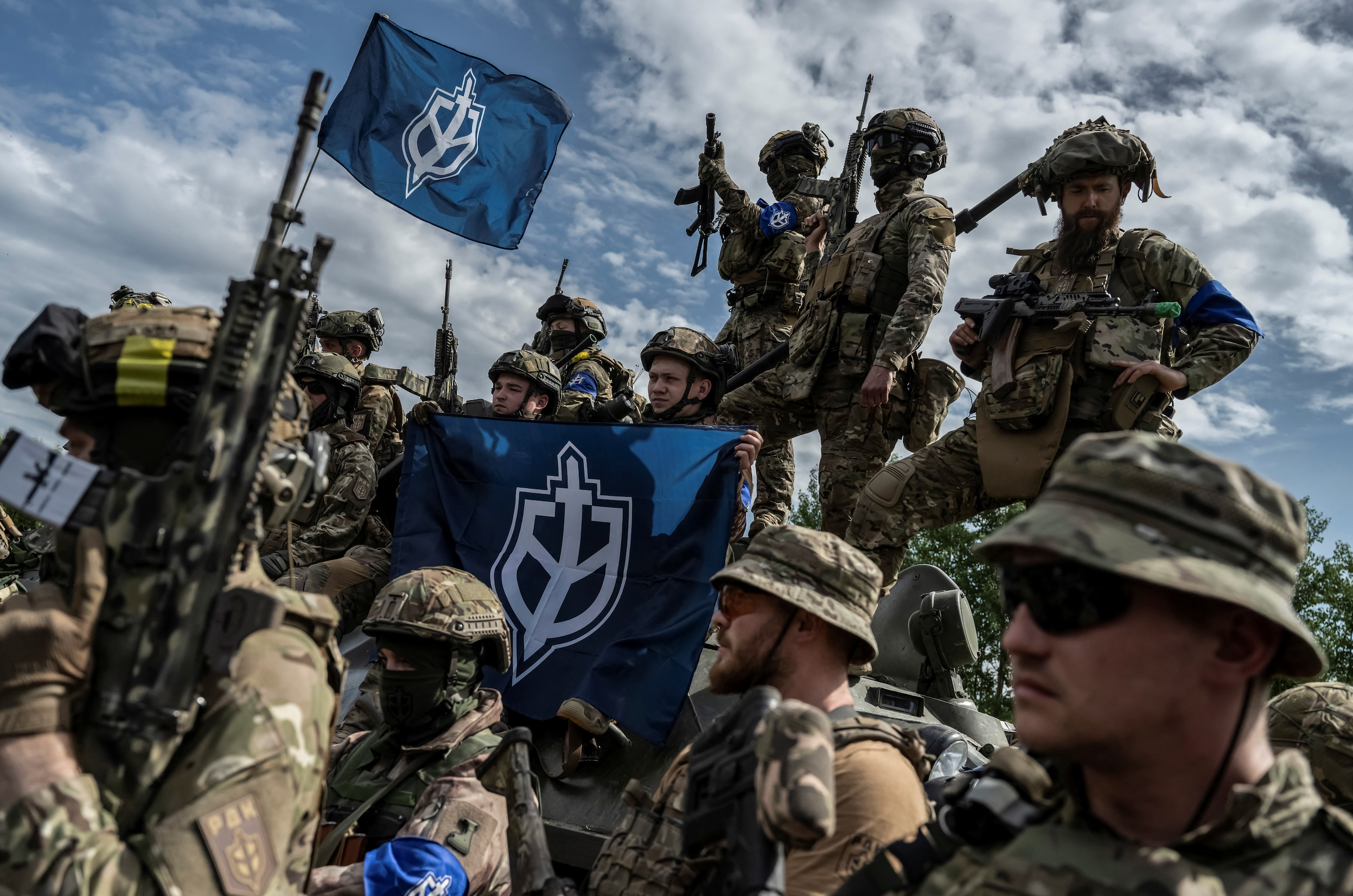 Members of the Russian Volunteer Corps are seen, amid Russia's attack on Ukraine, near the Russian border