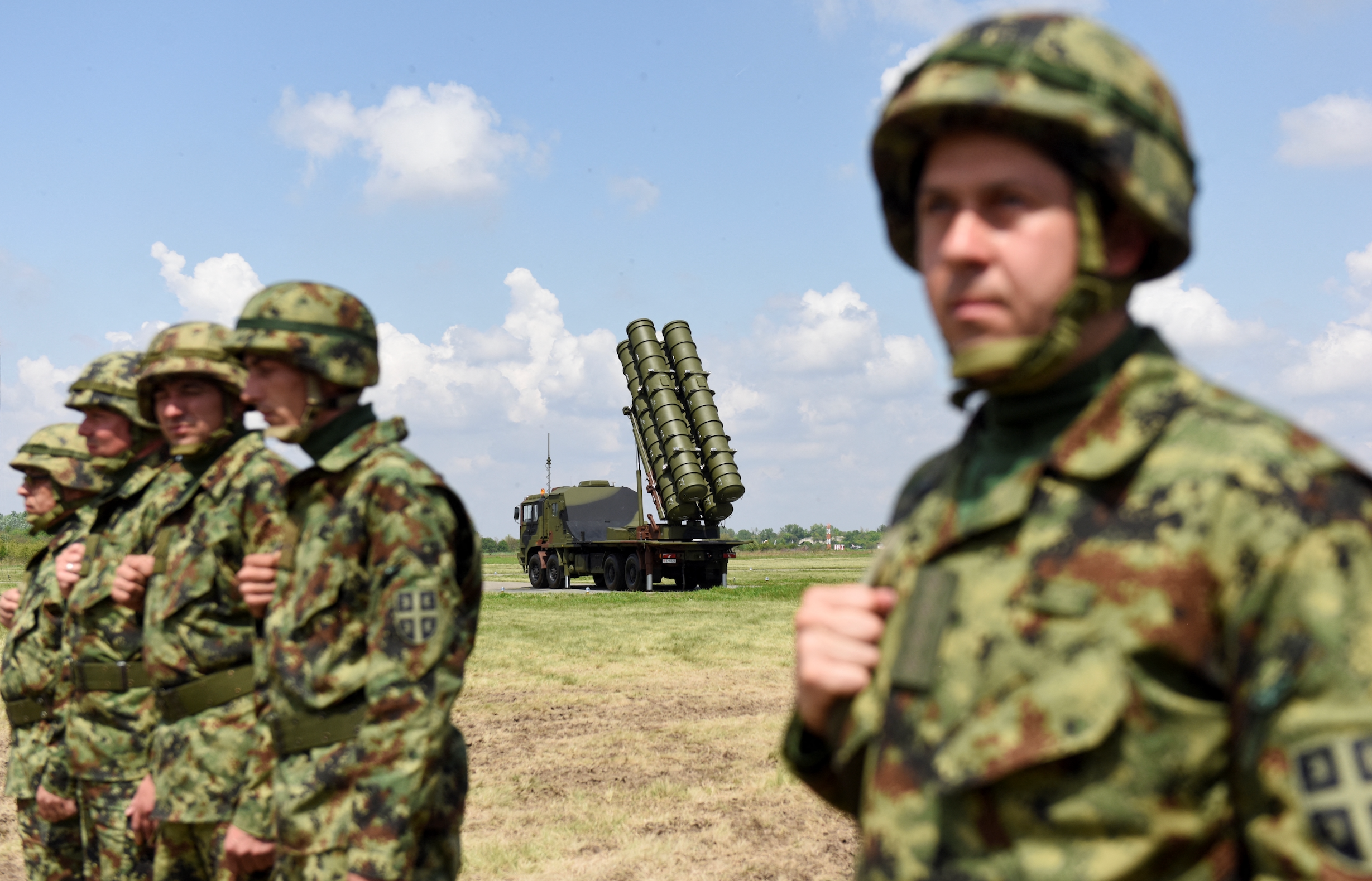 Serbian Army soldiers stand near the Chinese medium-range missile system FK-3 at the military airport