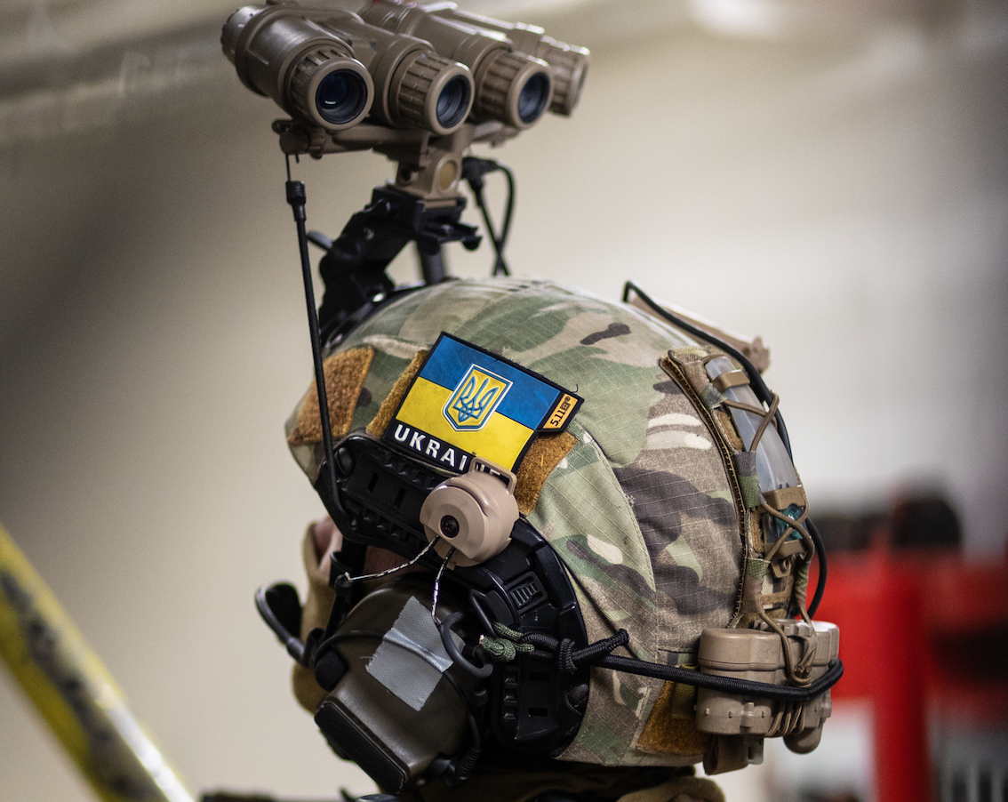 An operator from the Ukrainian Special Purpose Unit checks a stairwell during a simulated assault on an oil rig amid the Night Hawk 21
