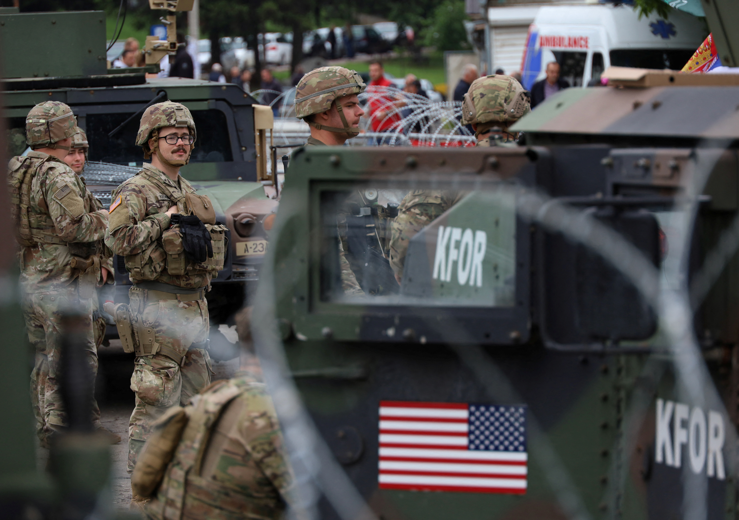U.S. Kosovo Force (KFOR) soldiers, under NATO, stand guard near a municipal office in Leposavic, Kosovo