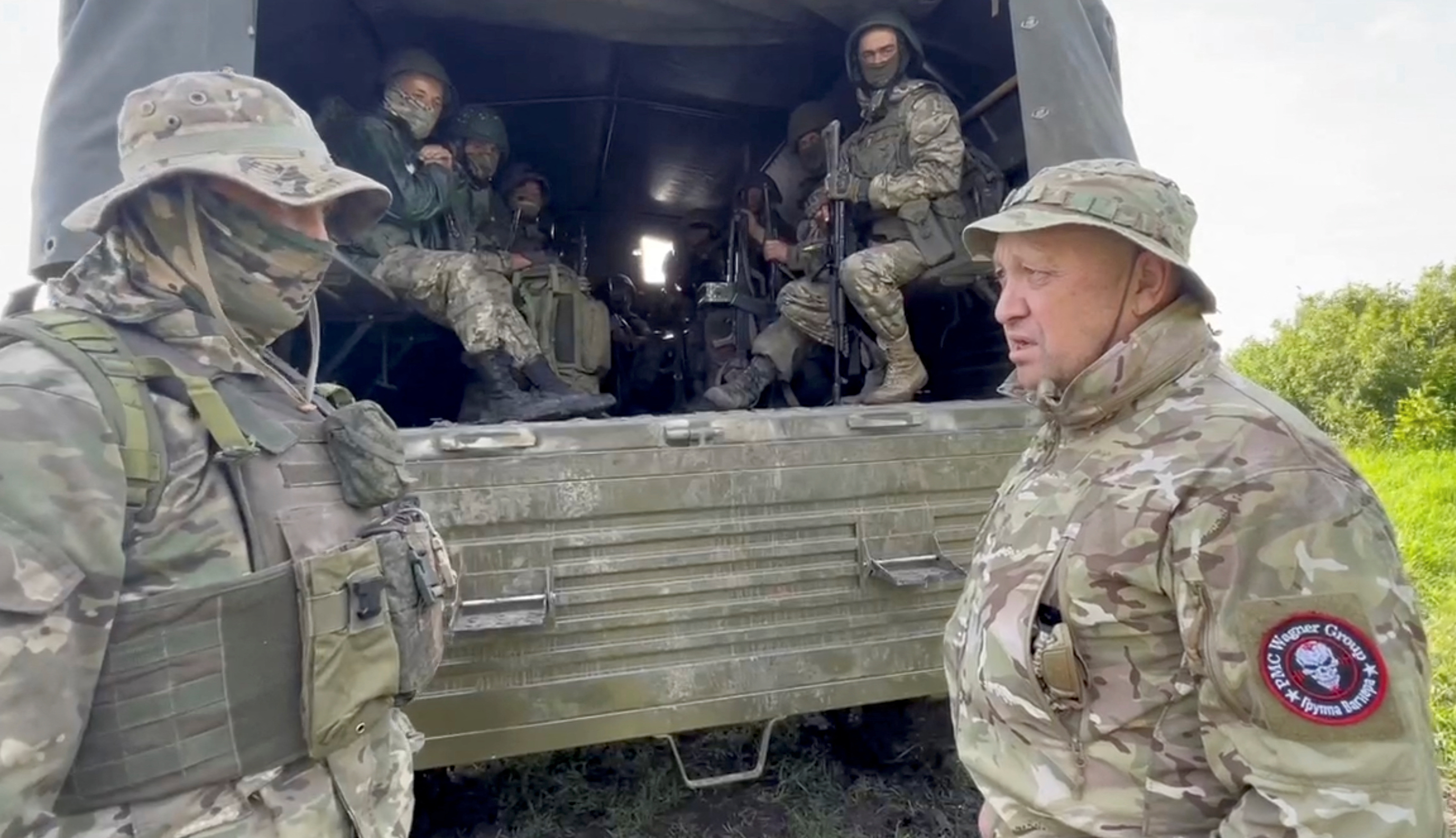 Founder of Wagner private mercenary group Yevgeny Prigozhin speaks with servicemen during withdrawal of his forces from Bakhmut