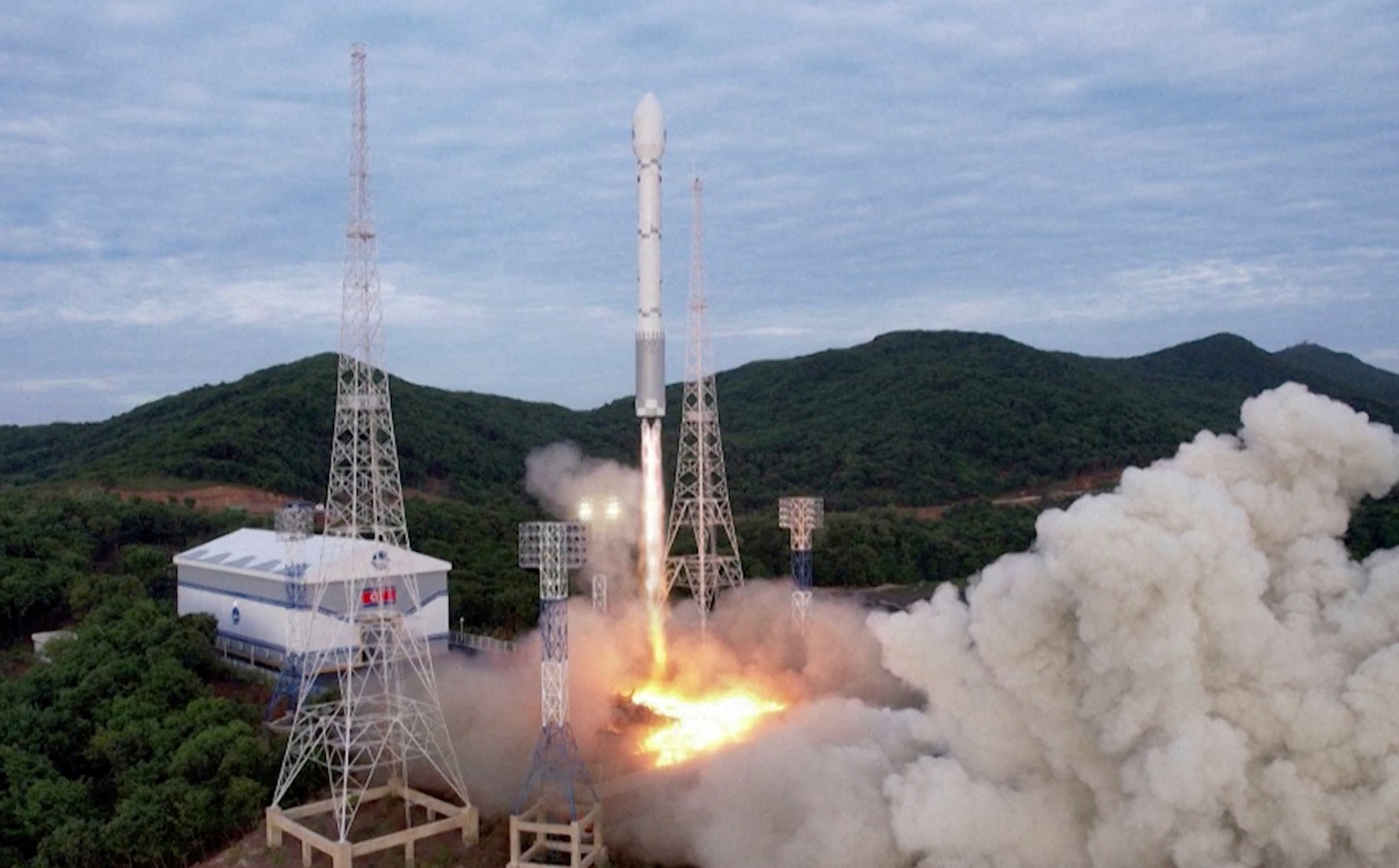 A still photograph shows what appears to be North Korea's new Chollima-1 rocket being launched in Cholsan County, North Korea