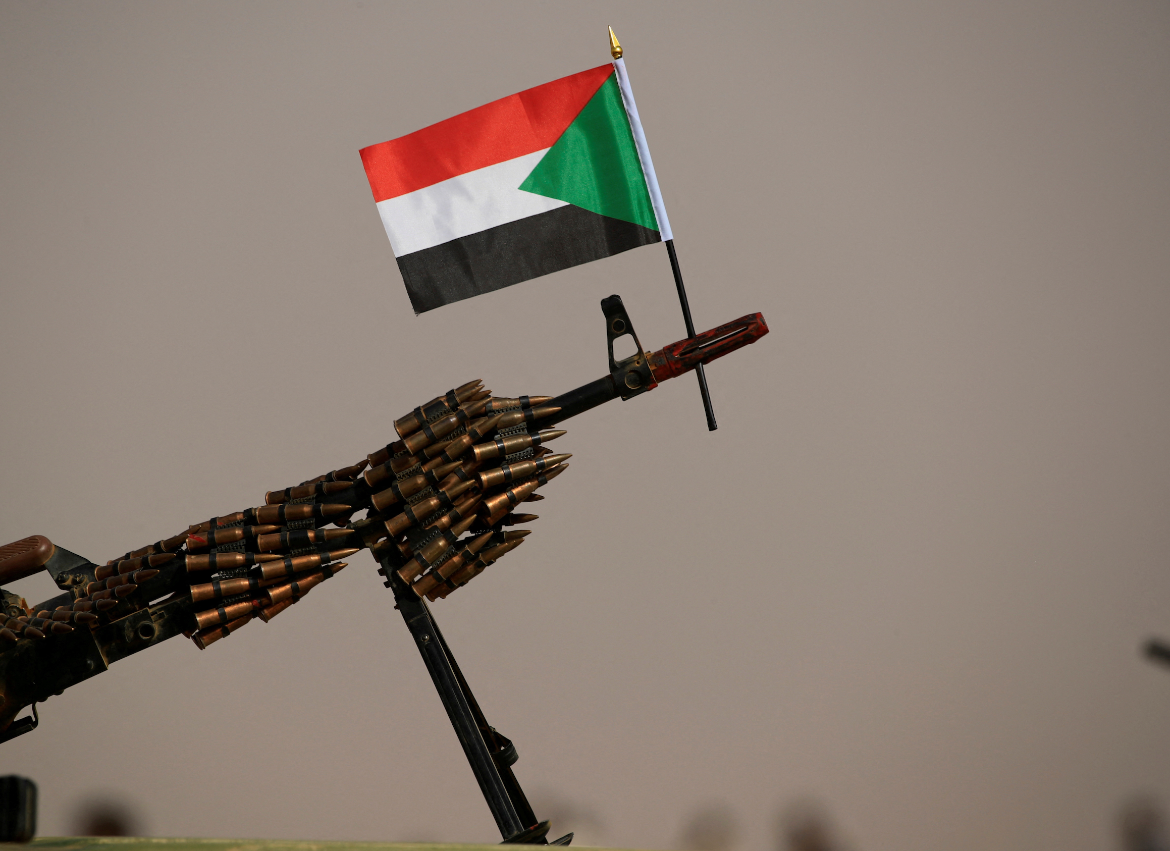 A Sudanese national flag is attached to a machine gun of Paramilitary Rapid Support Forces (RSF) soldiers