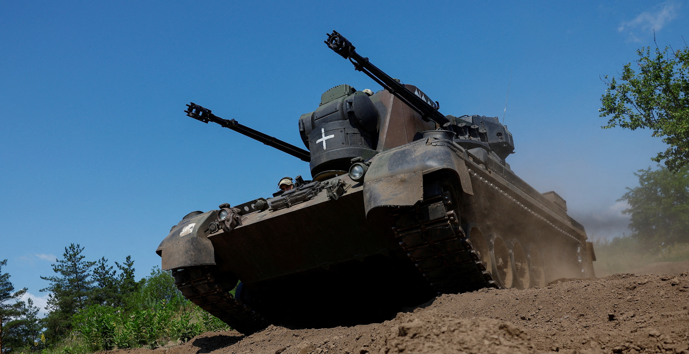 Ukrainian servicemen operate a Gepard self-propelled anti-aircraft gun during their combat shift