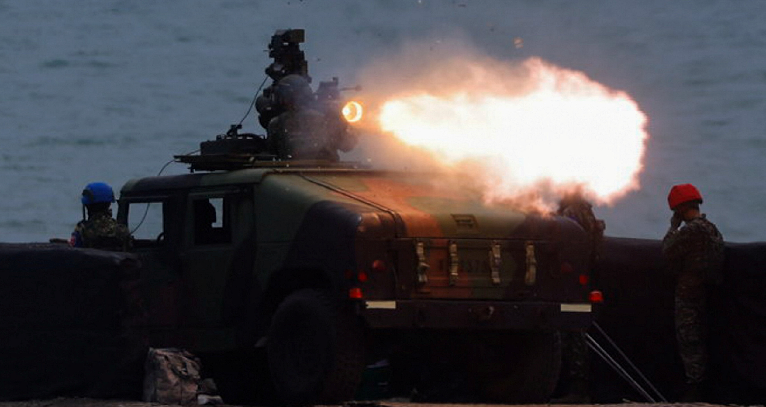A solider launches a US-made TOW 2A missile during a live fire drill in Pingtung, Taiwan July 3, 2023