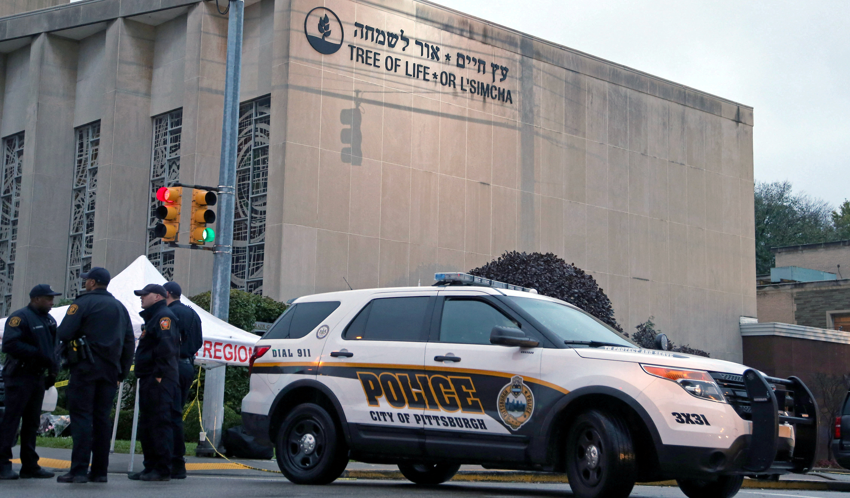 Police officers guard the Tree of Life synagogue