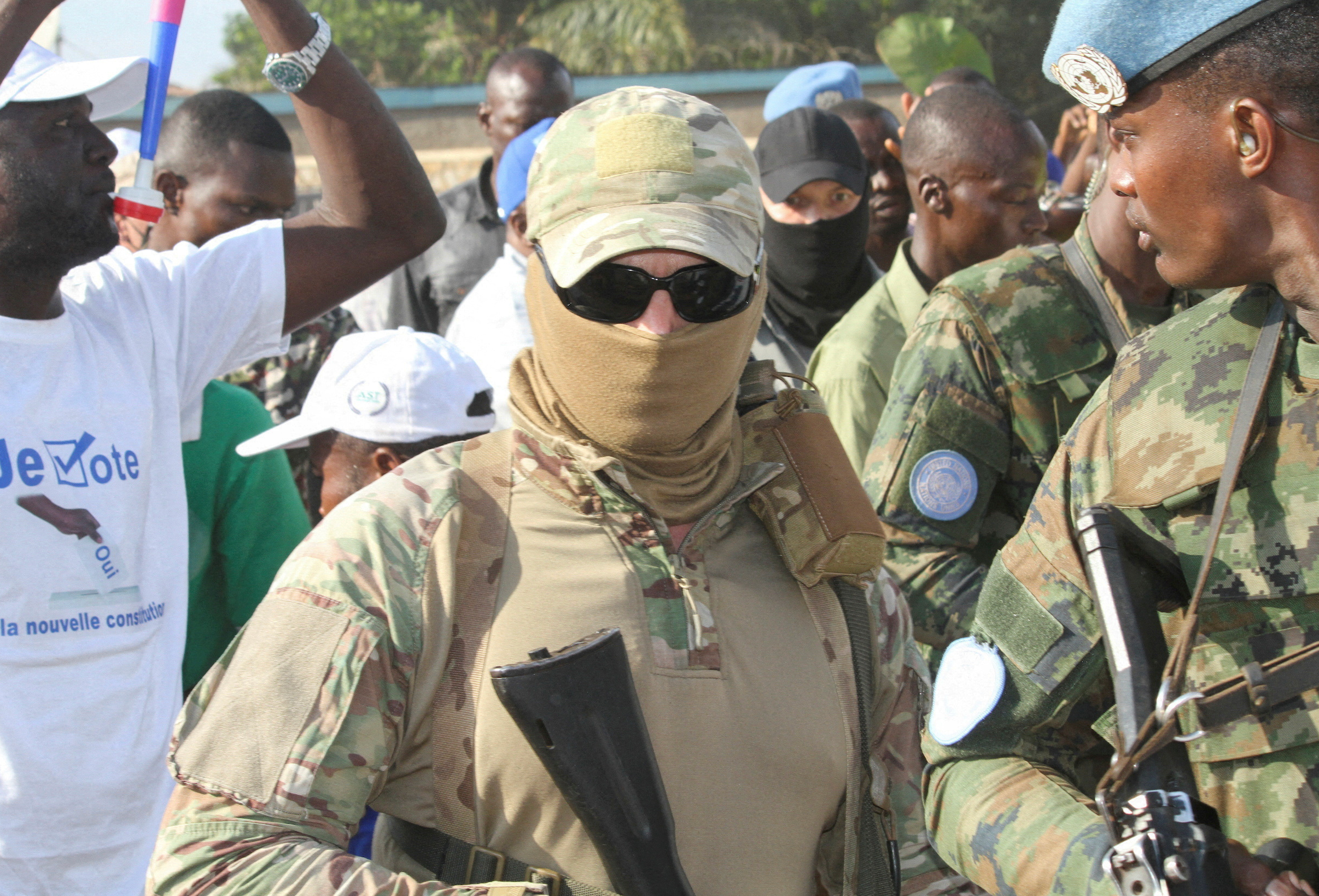 Russian officers from the Wagner group are seen around Central African president Faustin-Archange Touadera