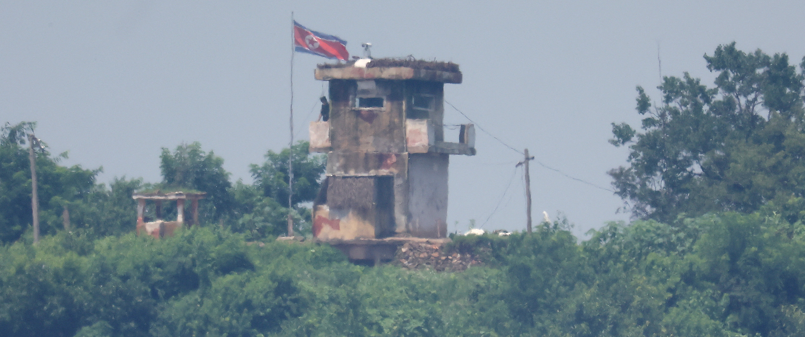 A North Korean soldier stands guard at their guard post in this picture taken near the demilitarized zone separating the two Koreas