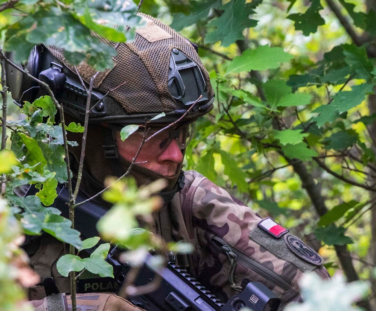 Poland sends more troops to border, Belarus denies helicopter violation