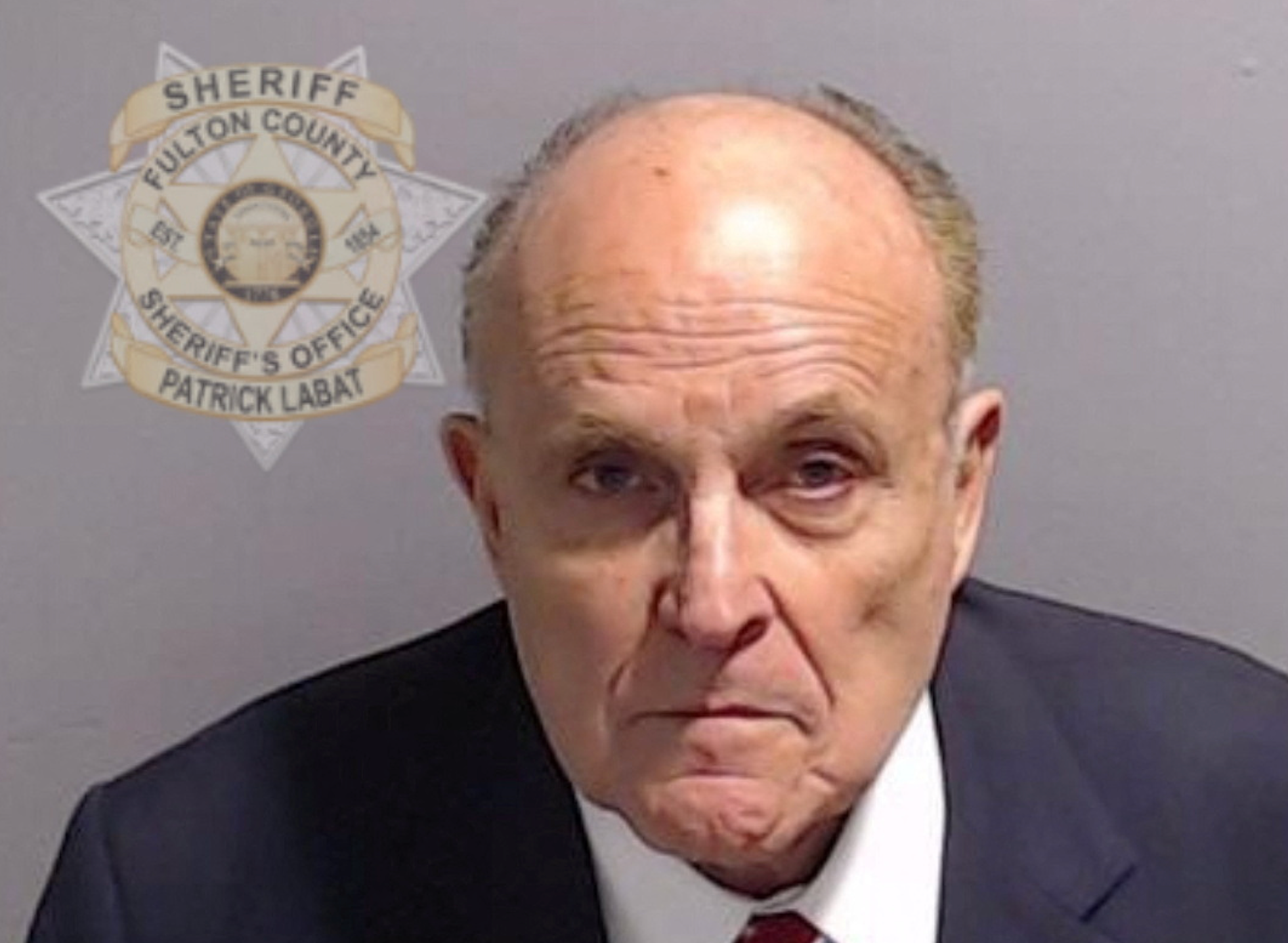 Giuliani surrenders in Trump election subversion case, $150,000 bond set