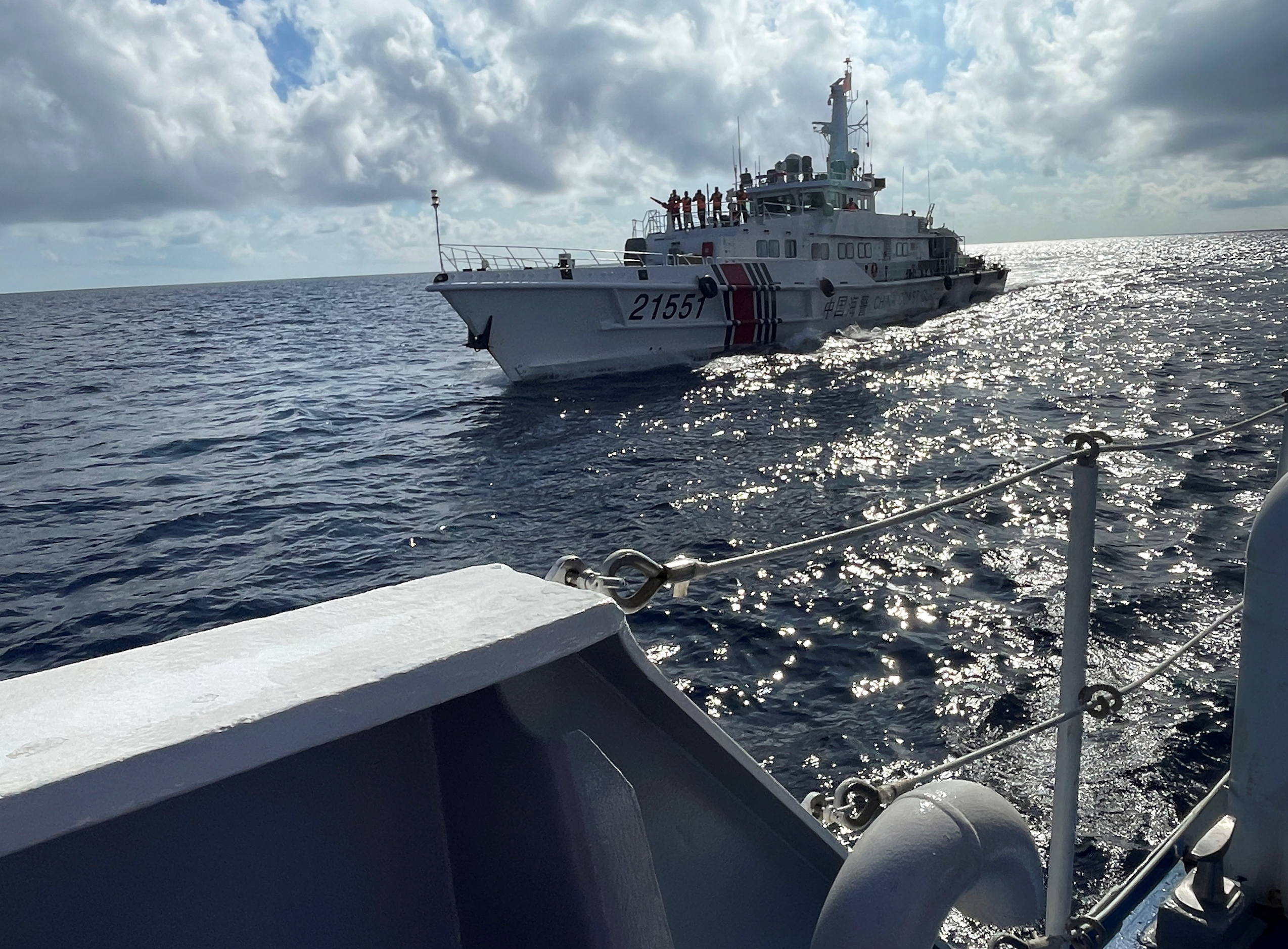 In cat and mouse game, Philippines resupplies troops in South China Sea atoll