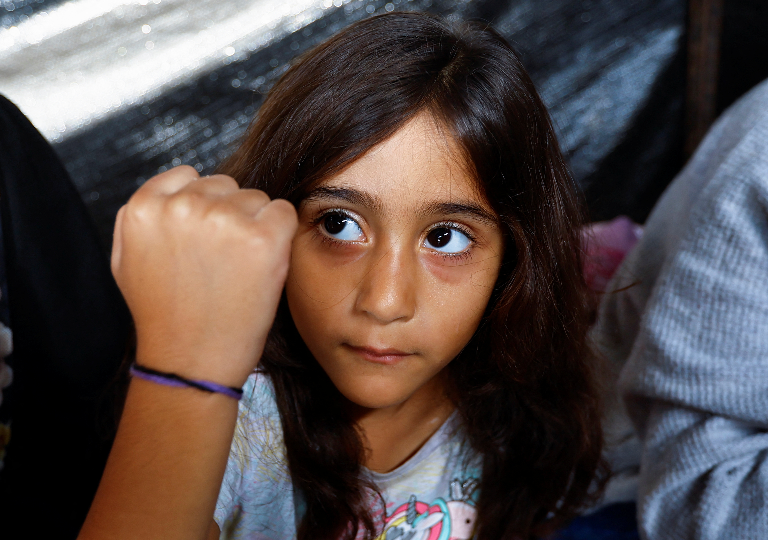 Gaza families wear ID bracelets to avoid burial in mass graves