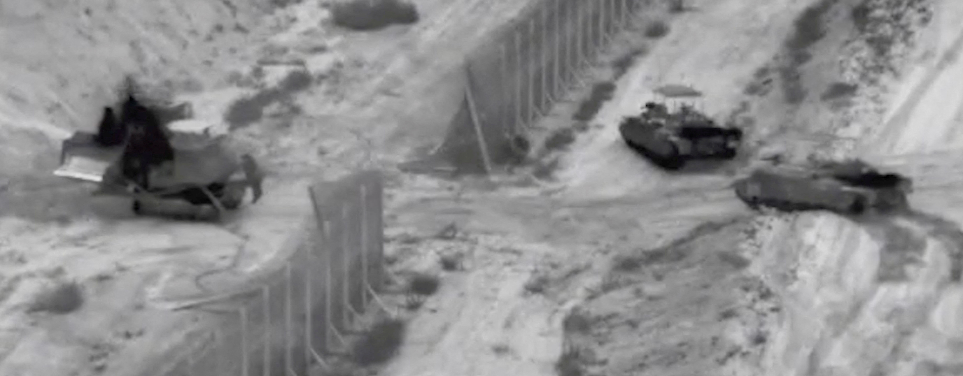 Israel raids Hamas sites in Gaza, hints at several “invasions”