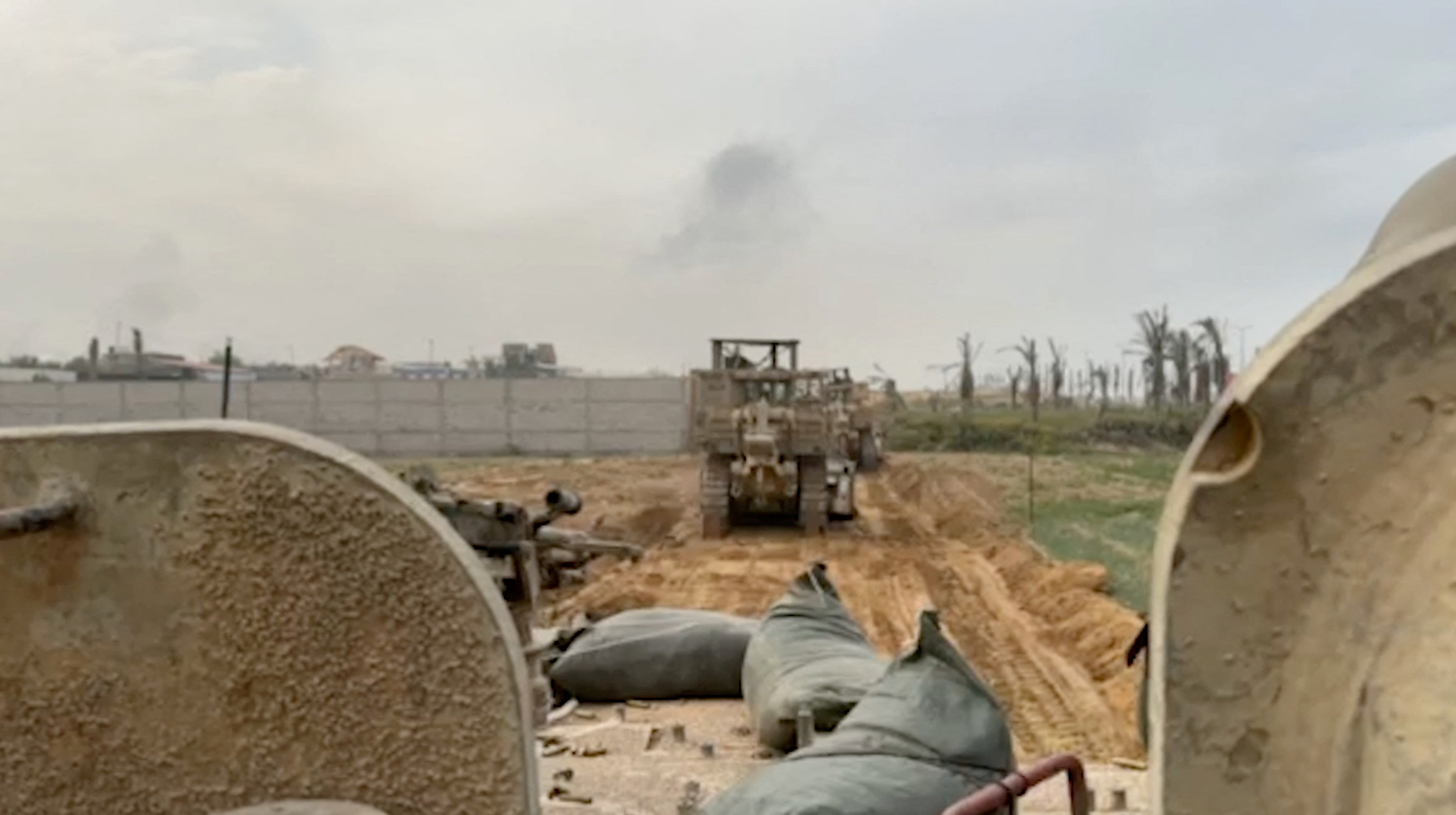 Israeli forces attack north Gaza's main city from east and west