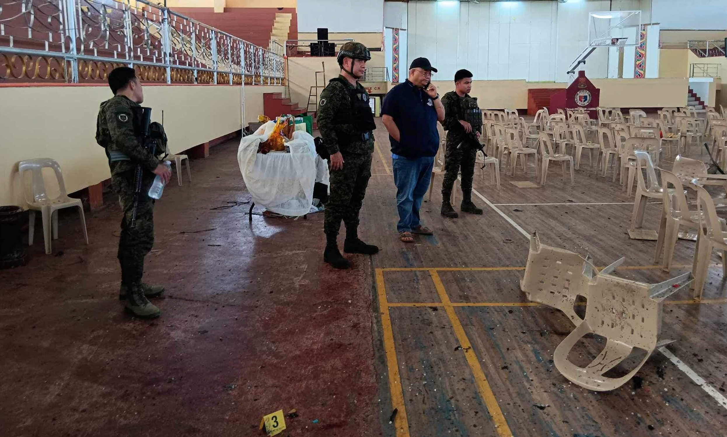 Islamic State group claims responsibility for deadly Philippine bombing, manhunt underway