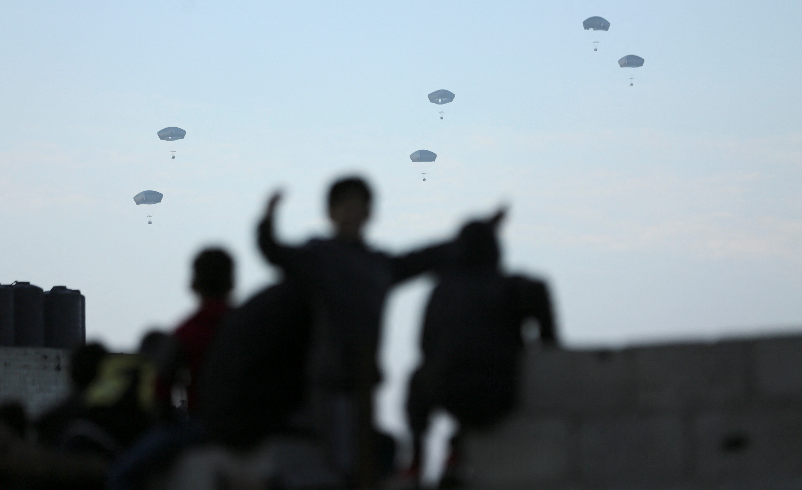 US makes its first Gaza aid airdrop as mediators to seek truce deal