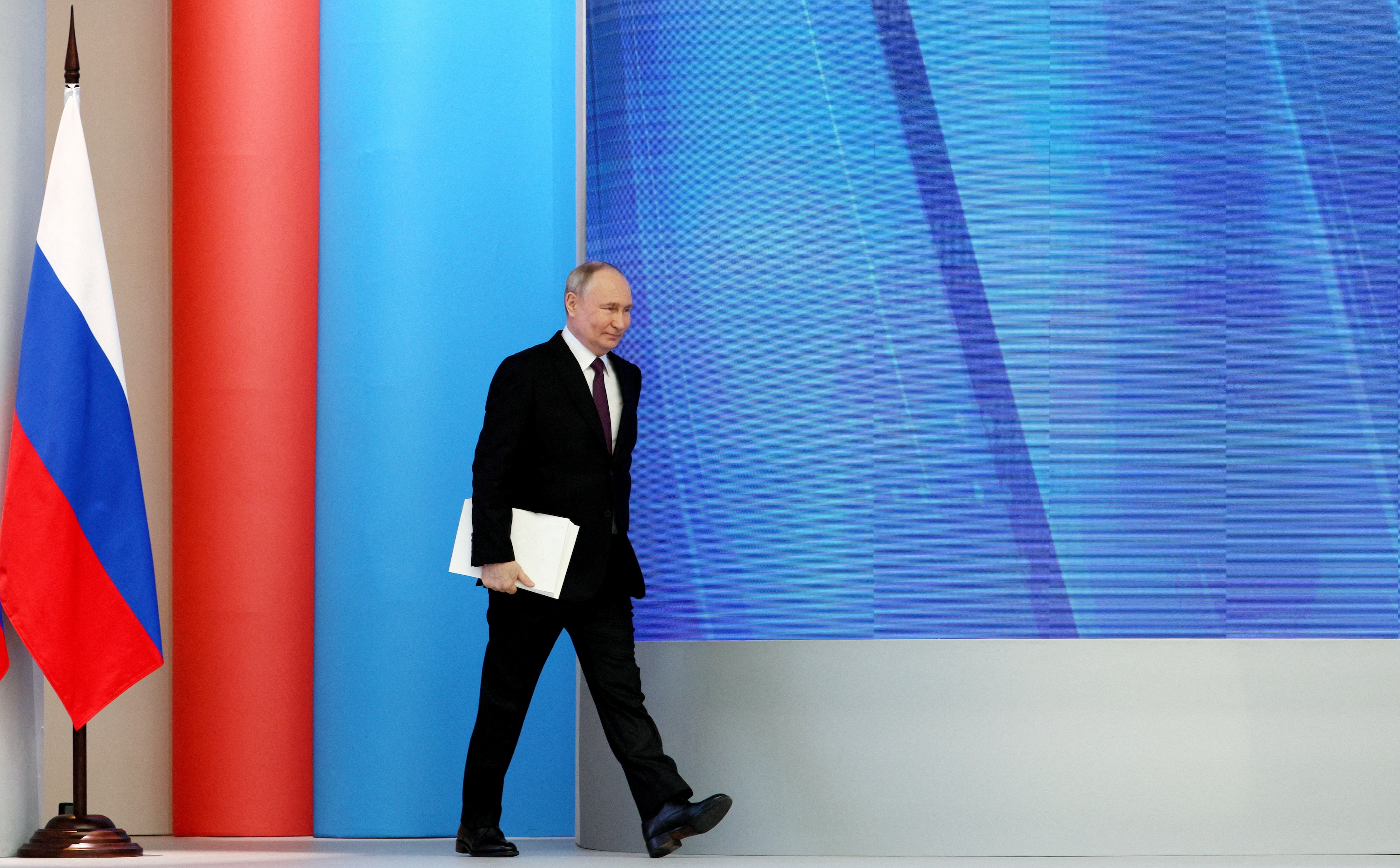Putin poised to hold Russian presidency for six more years as polls open