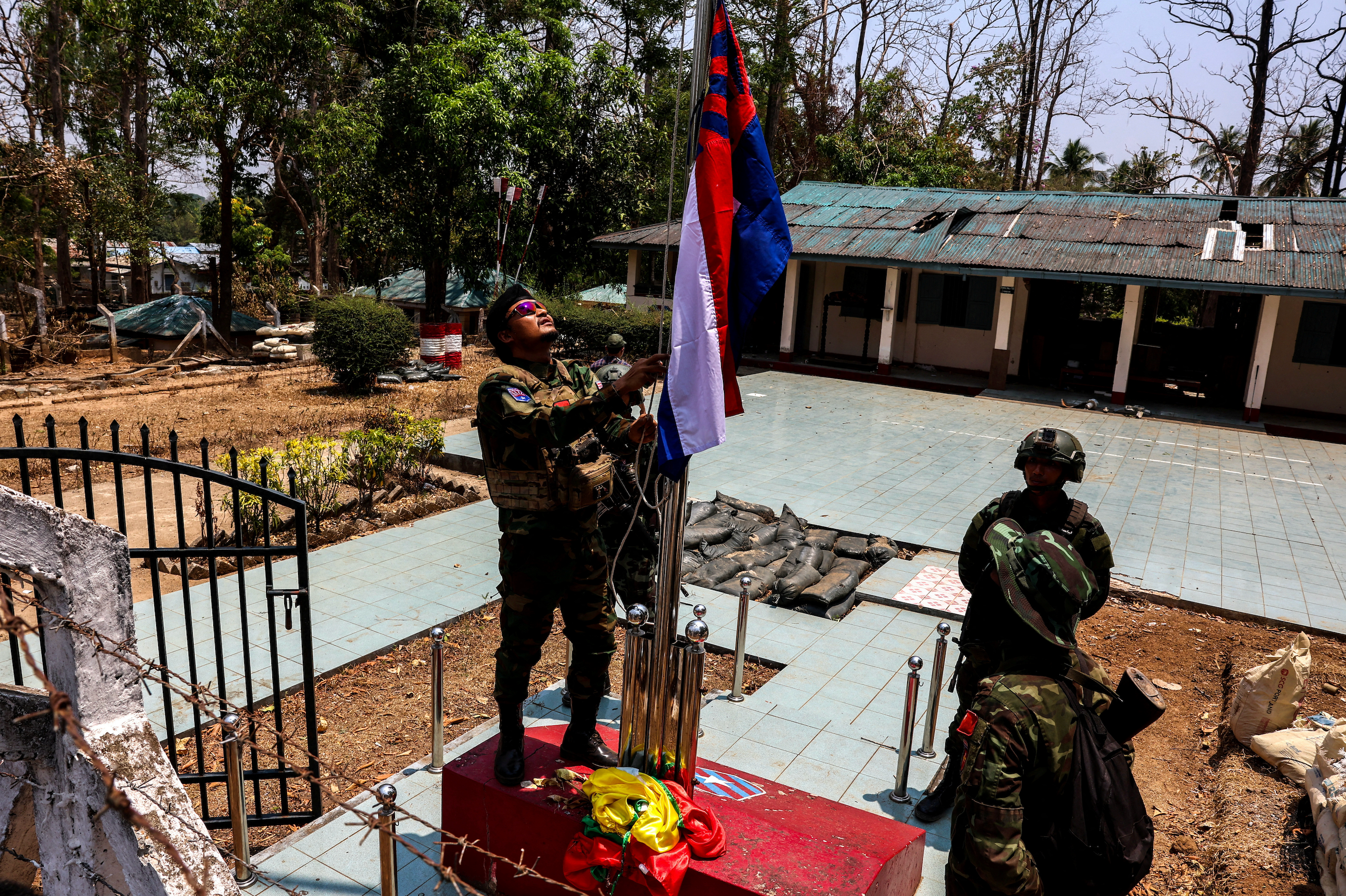 Rebels raise flag at seized Myanmar base, commander confident of retaining control