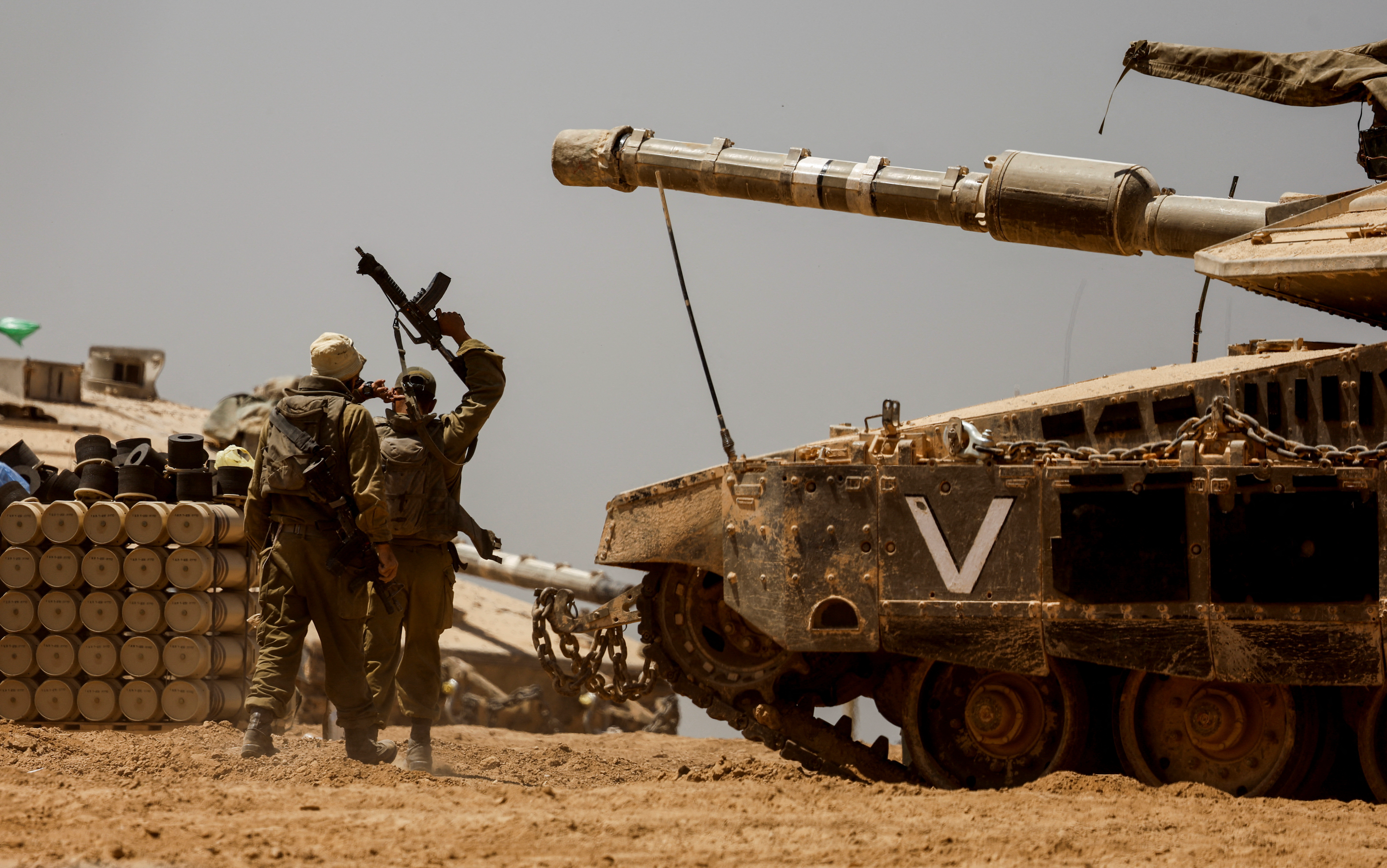 Israeli forces mass on Rafah's outskirts as US warns a major assault could halt arms