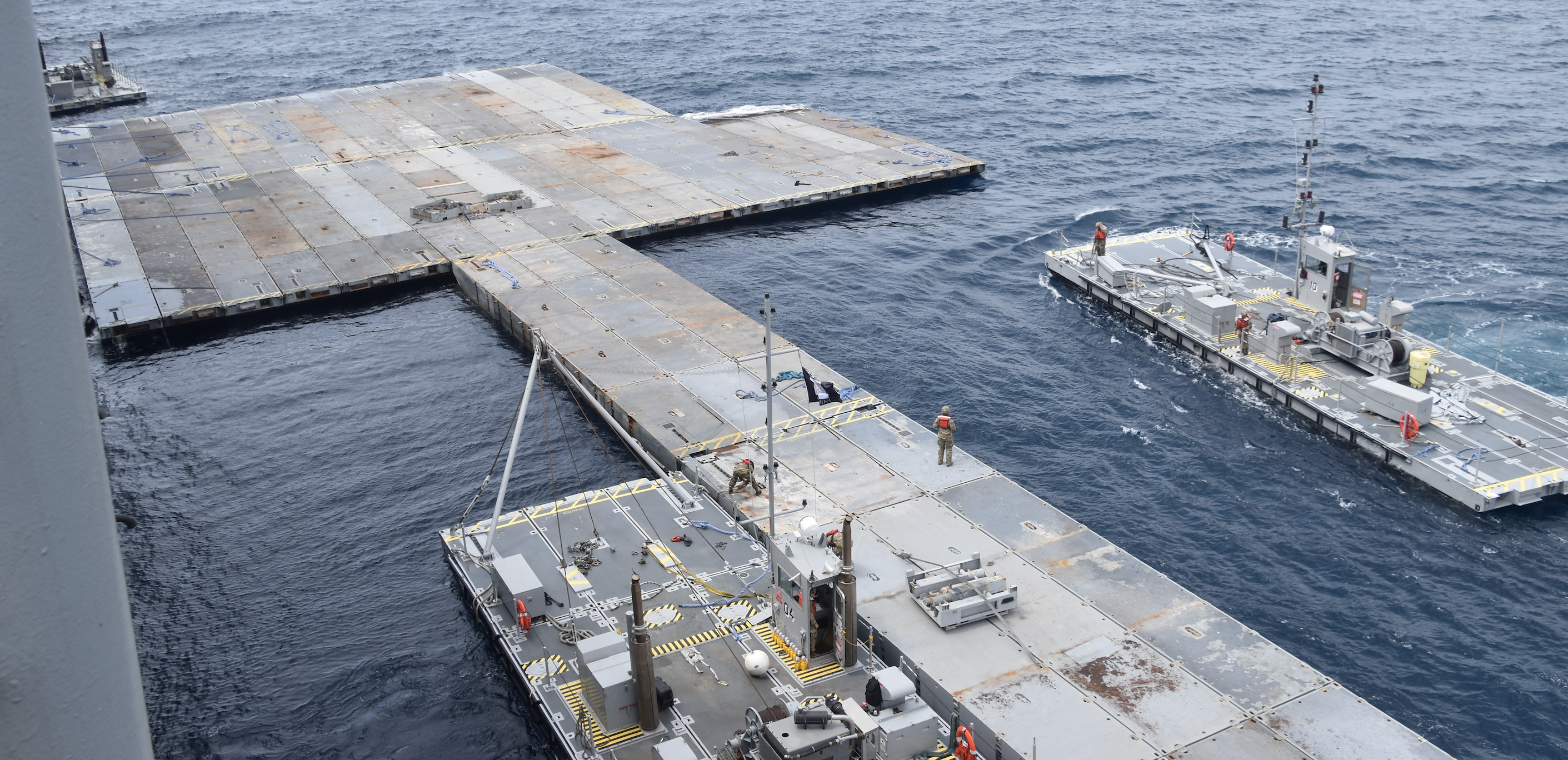 US anchors aid pier to Gaza beach but distribution plans uncertain
