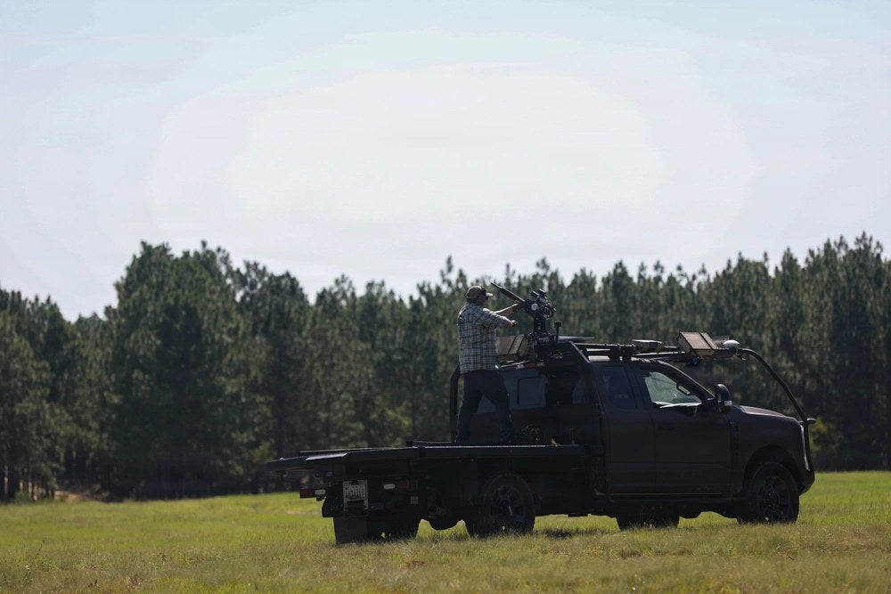An Edda counter-UAS turret mounted on a semi-autonomous Ford F-250 is tested during Project Sandhills 2.0 at Fort Bragg, North Carolina, on Aug. 18, 2026. The Army is evaluating the system as a mobile way to detect, track and shoot down drones. (U.S.