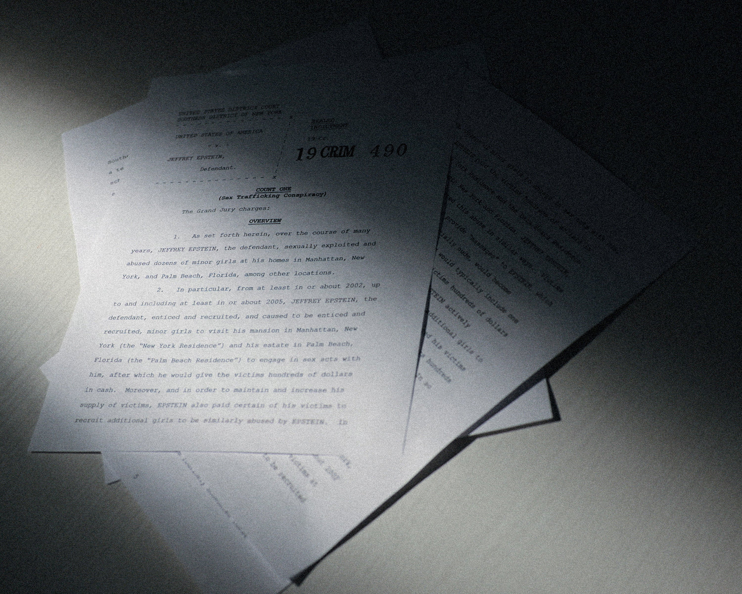 Justice Department releases some redacted Epstein files