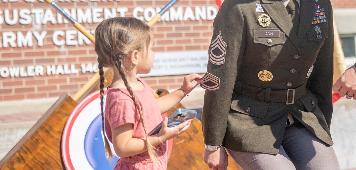U.S. Army file photo — Sgt. 1st Class Brandielyn Agin is promoted to master sergeant by her daughter during a 2023 ceremony at Fort Knox, Kentucky. The Army announced Sept. 16 a new authority allowing eligible E-7s serving in first sergeant roles to be
