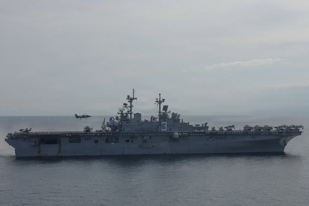USS Kearsarge operates in the Atlantic Ocean during training June 19, 2026. Roughly 90 sailors assigned to the ship later returned from an underway period to find their vehicles had been towed at Naval Station Norfolk, prompting the base to review its