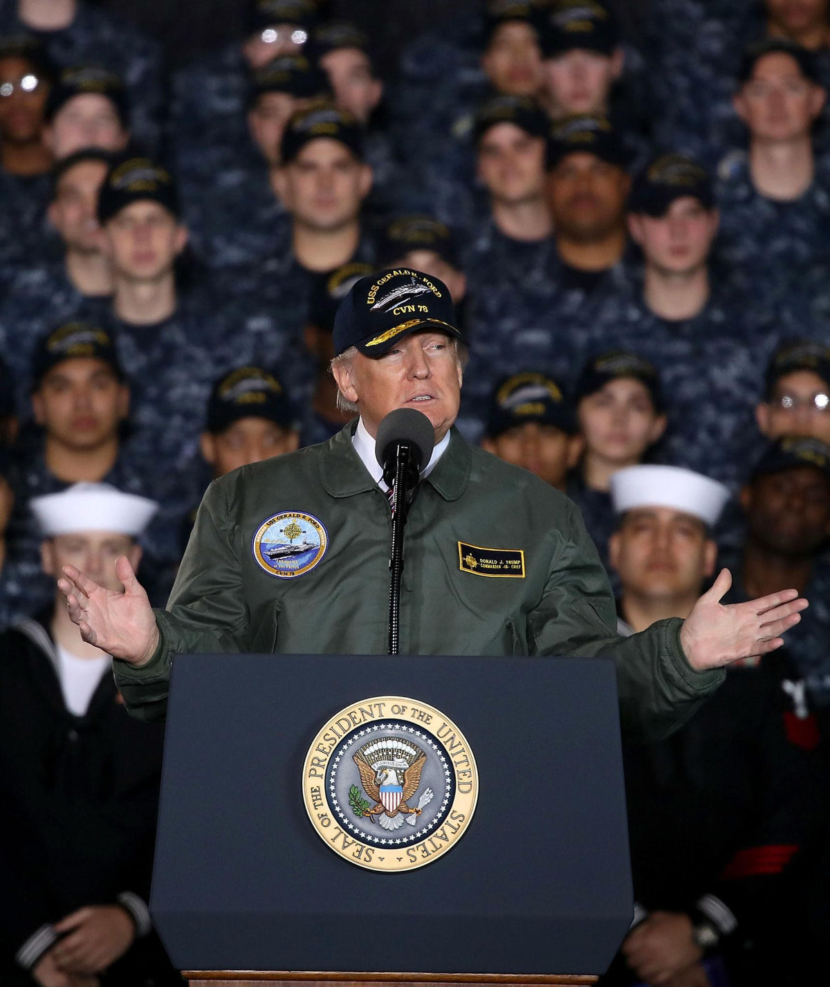 President Donald Trump addresses sailors aboard the USS Gerald R. Ford in Newport News, Virginia, on March 2, 2017. Trump has attributed his preference for steam-powered aircraft catapults partly to a conversation during the visit with a sailor Navy