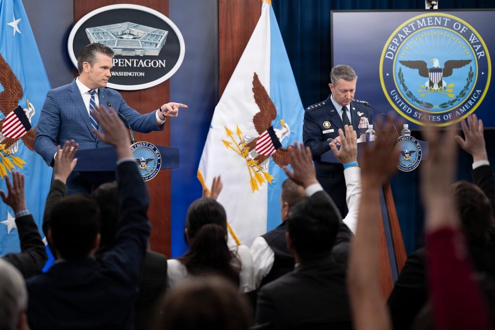 Secretary Pete Hegseth and Joint Chiefs Chairman Gen. Dan Caine brief reporters on Operation Epic Fury at the Pentagon on April 8, 2026. New reporting says Hegseth later personally met with the two airmen rescued after an F-15E was shot down over Iran as