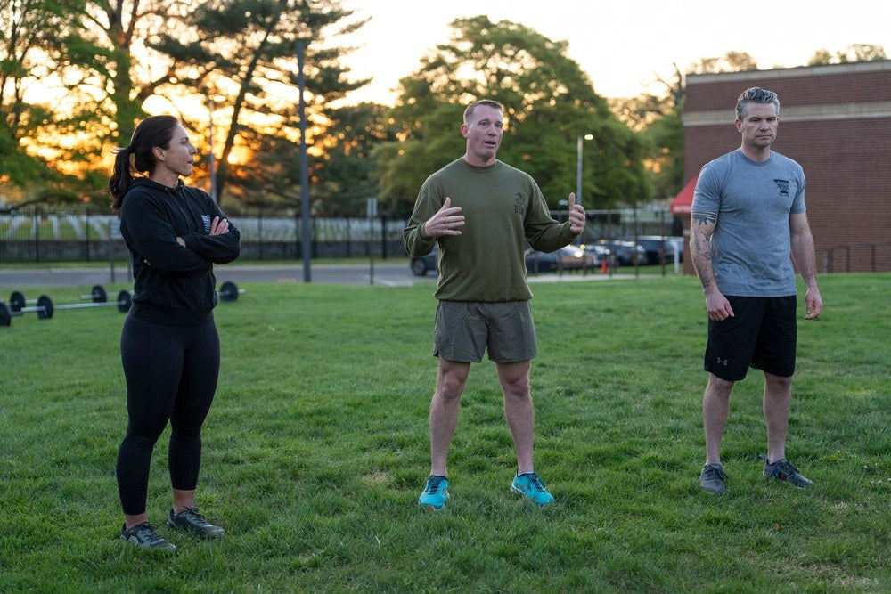Defense Secretary Pete Hegseth participates in morning physical training with U.S. Marines at Fort Myer-Henderson Hall, Virginia, April 17, 2025. Marine Corps data now provides the first results from new sex-neutral PFT scoring for Marines in combat-arms