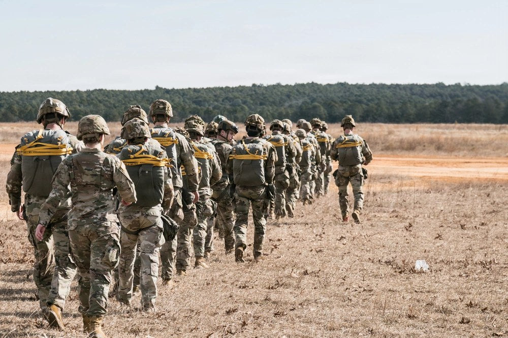 U.S. paratroopers assigned to the 1st Brigade Combat Team, 82nd Airborne Division, conduct an airborne operation from a CH-47 Chinook at Sicily Drop Zone, Fort Bragg, North Carolina, Feb. 12, 2026. (U.S. Army photo by Capt. Alvin Cade Jr.)