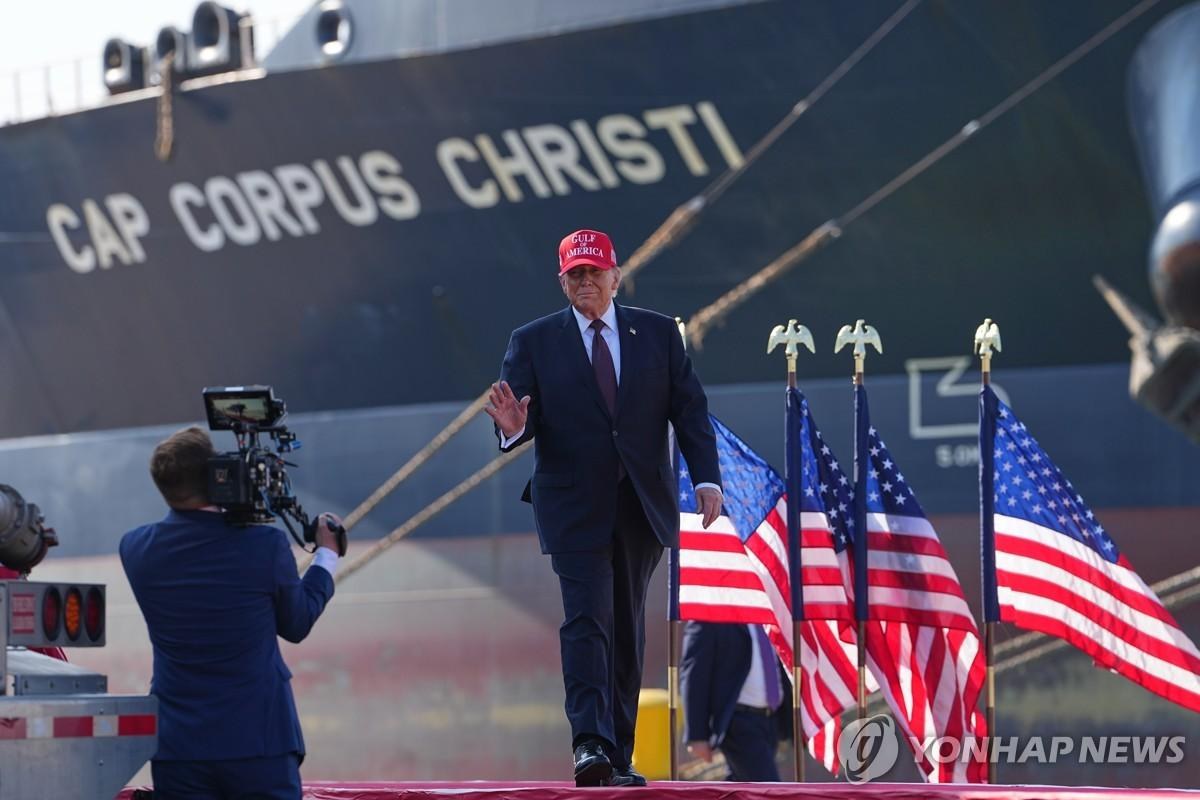 President Donald Trump appears at a campaign rally at the Port of Corpus Christi, Texas, on October 27, 2026, with the oil tanker Angerona nearby. During the event, Trump suggested Venezuela could become the 51st U.S. state, months after American forces