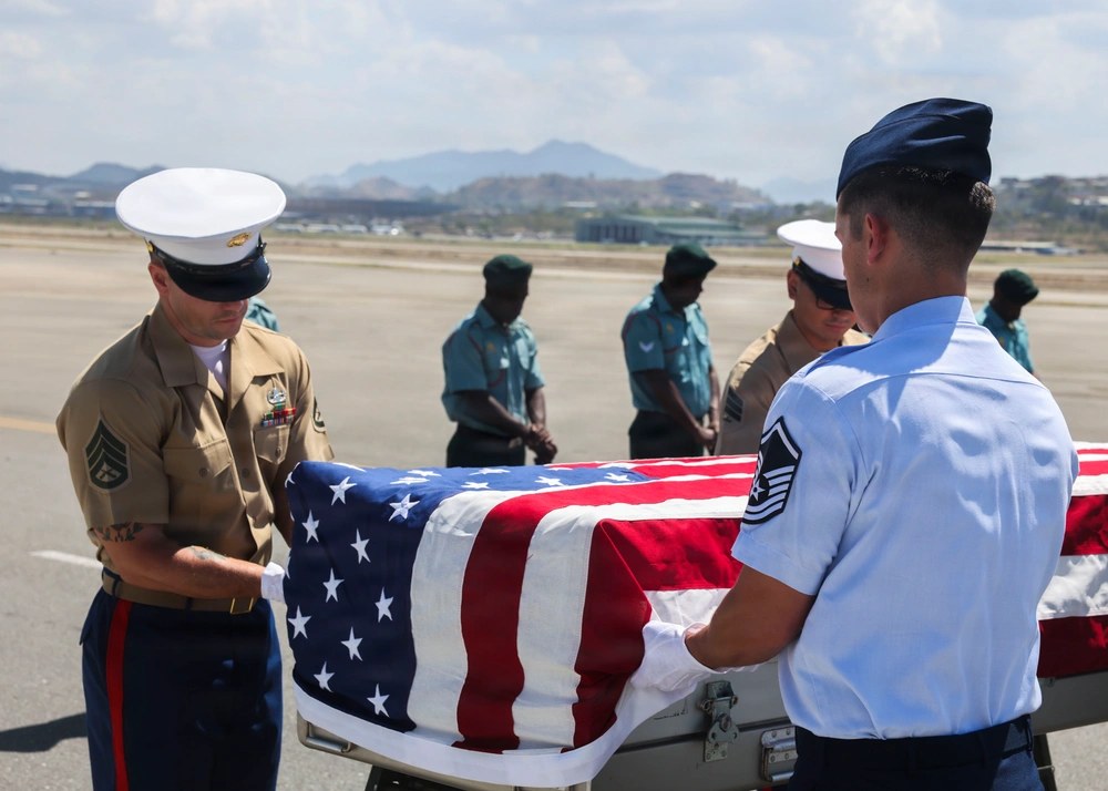 U.S. service members prepare a flag-draped transfer case during a Defense POW/MIA Accounting Agency repatriation ceremony in Port Moresby, Papua New Guinea, Sept. 2, 2026. The case will be transported to DPAA’s laboratory in Hawaii for possible