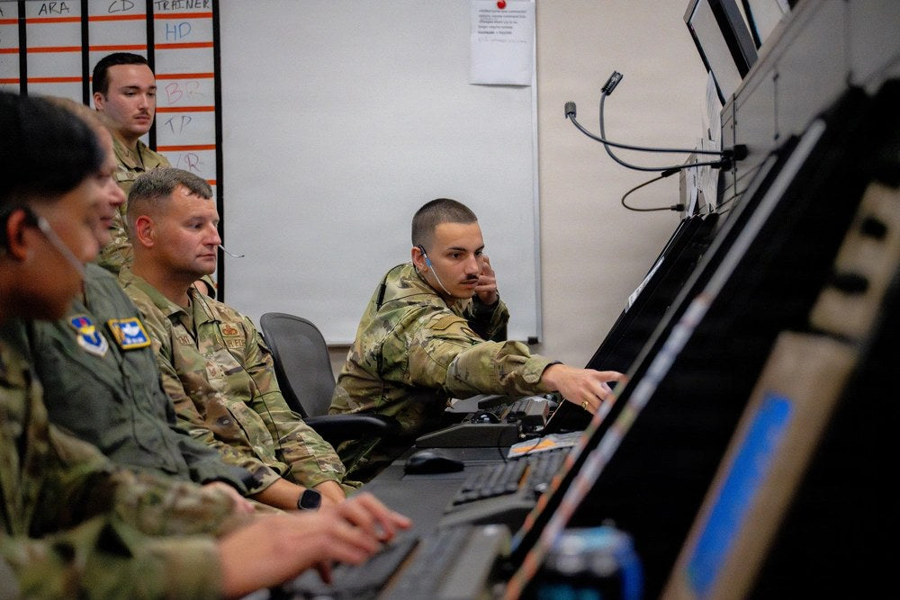 Illustrative file photo. Air traffic control personnel work at radar consoles at Altus Air Force Base, Oklahoma, in August 2026. An FAA communications failure on Sept. 21 disrupted roughly 7,000 flights after a primary circuit failed and officials
