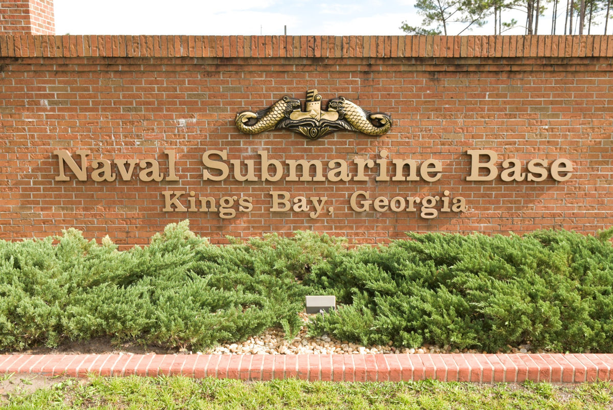 The entrance to Naval Submarine Base Kings Bay, Georgia, is shown in a U.S. Navy file photo. The base has agreed that blocking a retired Army veteran from its official Facebook page violated his First Amendment rights. (U.S. Navy photo by Electrician's