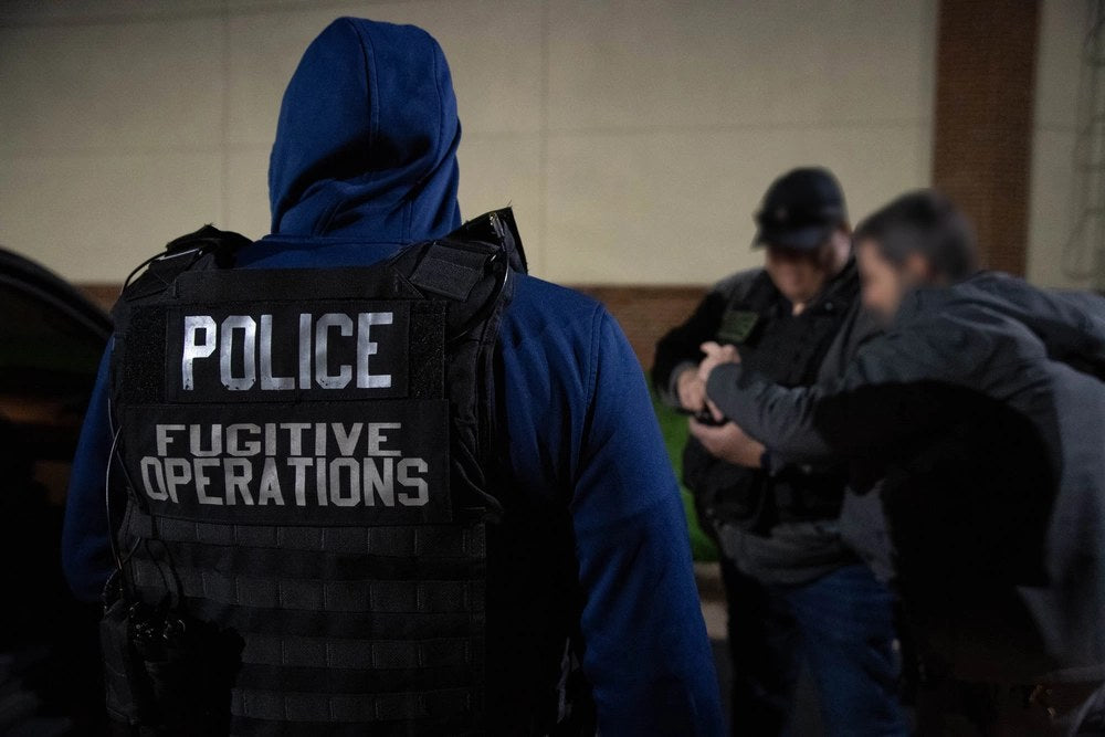 U.S. Immigration and Customs Enforcement officers conduct an Enforcement and Removal Operations arrest in Manassas, Virginia, in April 2022. A new ProPublica investigation published Oct. 6, 2026, documents 506 U.S. citizens detained by federal