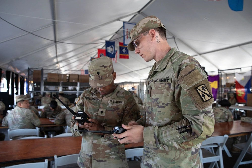 U.S. Army Spc. Jakob Noonan of the Oklahoma National Guard works with radio equipment at Joint Base Anacostia-Bolling in Washington, D.C., Sept. 7, 2026. Noonan was arrested later that month and charged with carrying a pistol without a license following