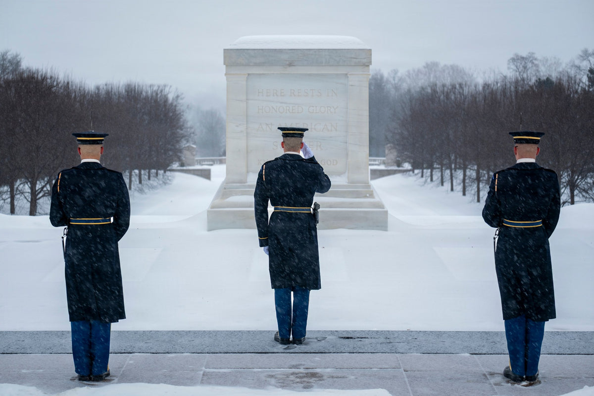U.S. Army file photo — Old Guard sentinels salute at the Tomb of the Unknown Soldier at Arlington National Cemetery on Jan. 25, 2026. The Defense POW/MIA Accounting Agency plans to seek permission to exhume the Korean War Unknown and attempt to identify