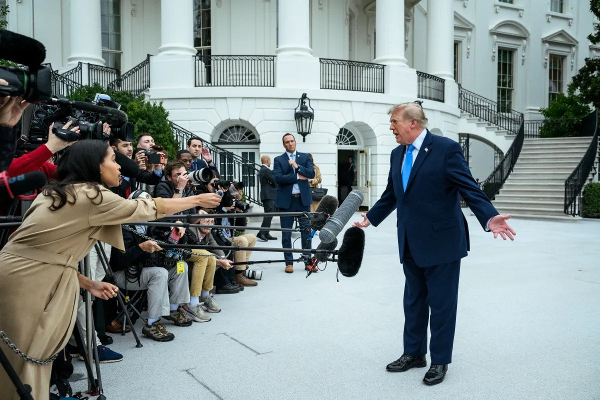 President Donald Trump speaks with reporters on the South Lawn of the White House in Washington, D.C., Oct. 3, 2026. Two days later, at a rally in Grand Island, Nebraska, Trump said Iran could “take out” Los Angeles or San Diego and called it a “very